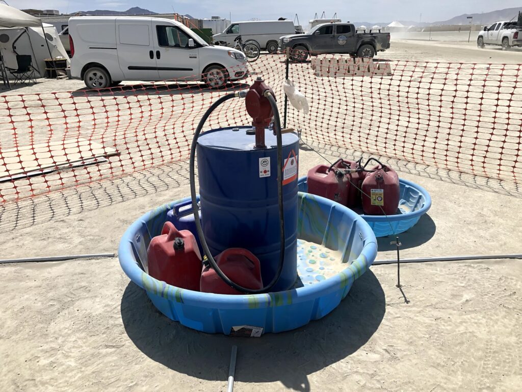 Large container of fuel inside a baby pool