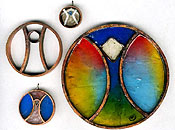 Examples of Burning Man pendants. 