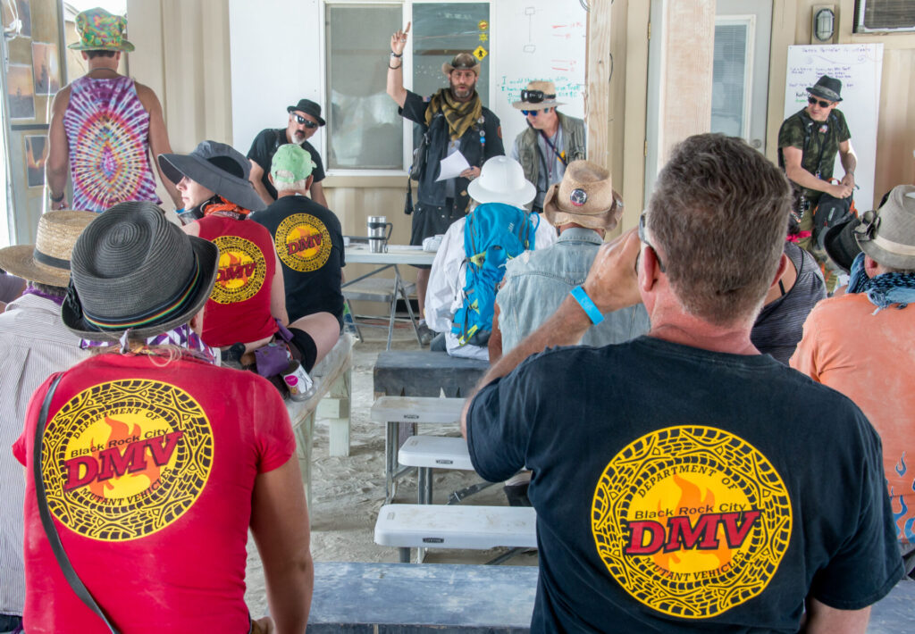 Volunteers at the Department of Mutant Vehicles attending a training session. 