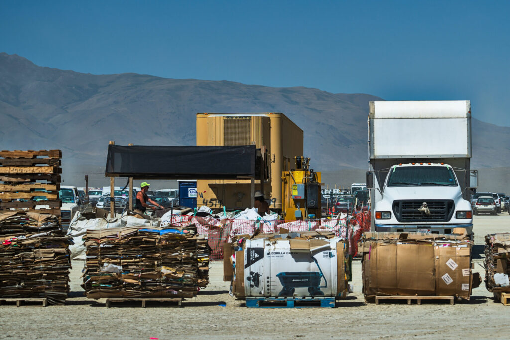 Large packing boxes are carefully flattened and bundled before leaving Black Rock City.