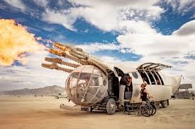 A silver mutant vehicle with six dragon heads at the front, all breathing fire