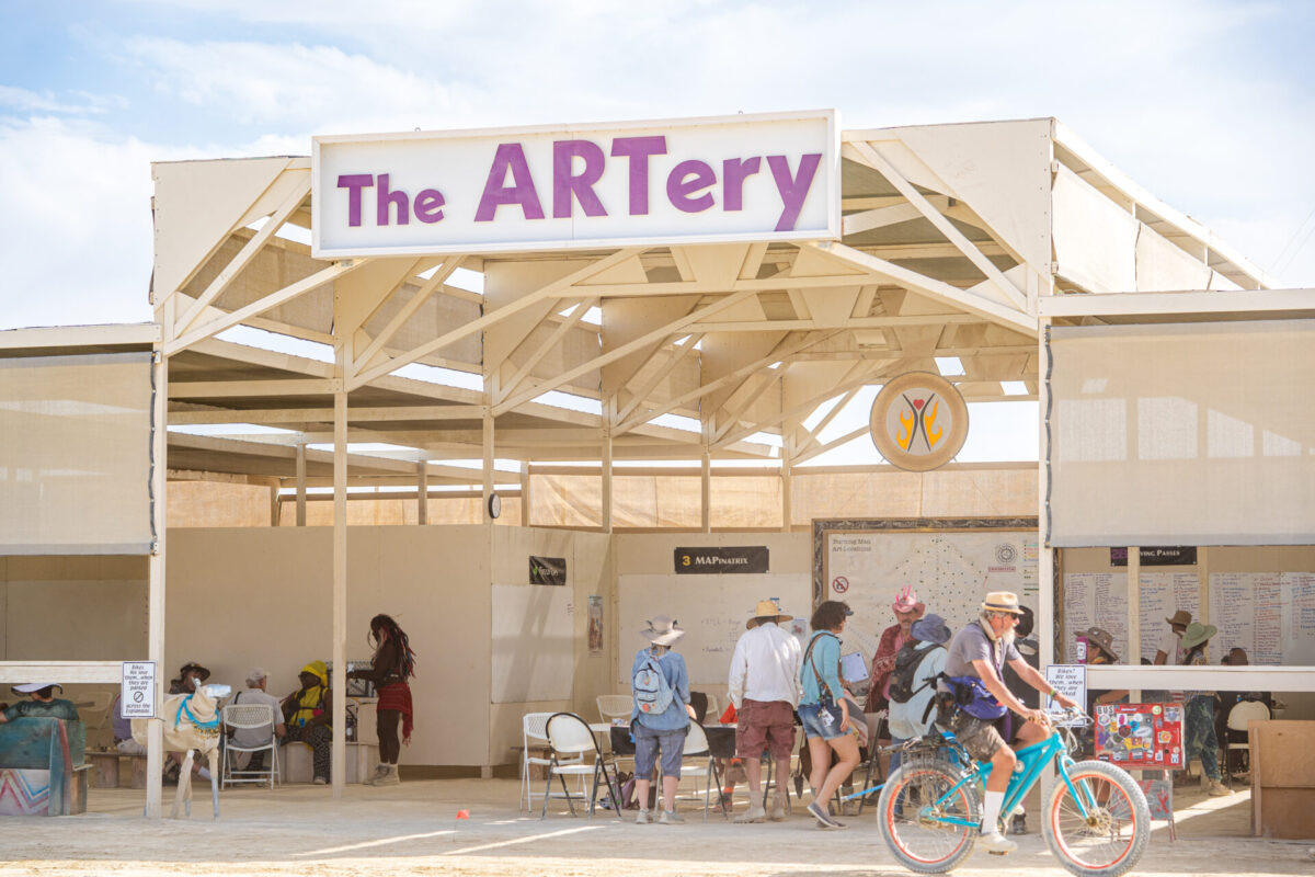 Volunteers help participants at the ARTery during build week 2025 