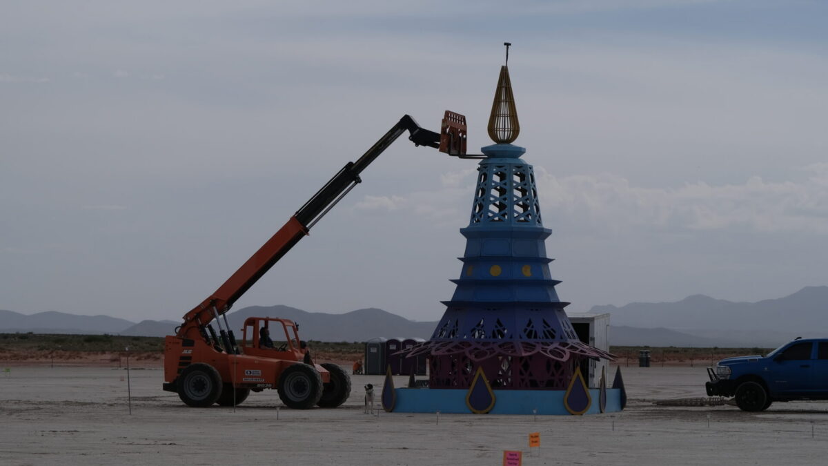 Heavy equipment erecting the temple